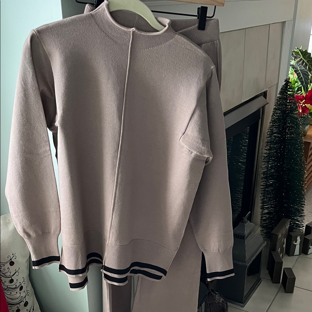Women's Taupe with black trim.Sweater and pants set